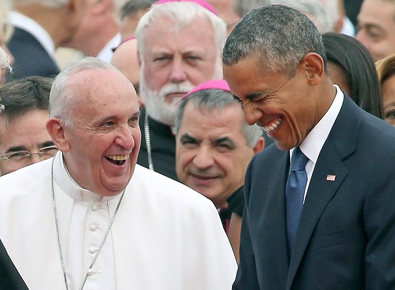 JOINT BASE ANDREWS, MD - SEPTEMBER 22:  (EDITORS NOTE: Retransmission with alternate crop)  Pope Francis (L) is escorted by U.S. President Barack Obama as he greets and other political and Catholic church leaders after arriving from Cuba September 22, 2015 at Joint Base Andrews, Maryland. Francis will be visiting Washington, New York City and Philadelphia during his first trip to the United States as Pope.  (Photo by Chip Somodevilla/Getty Images)