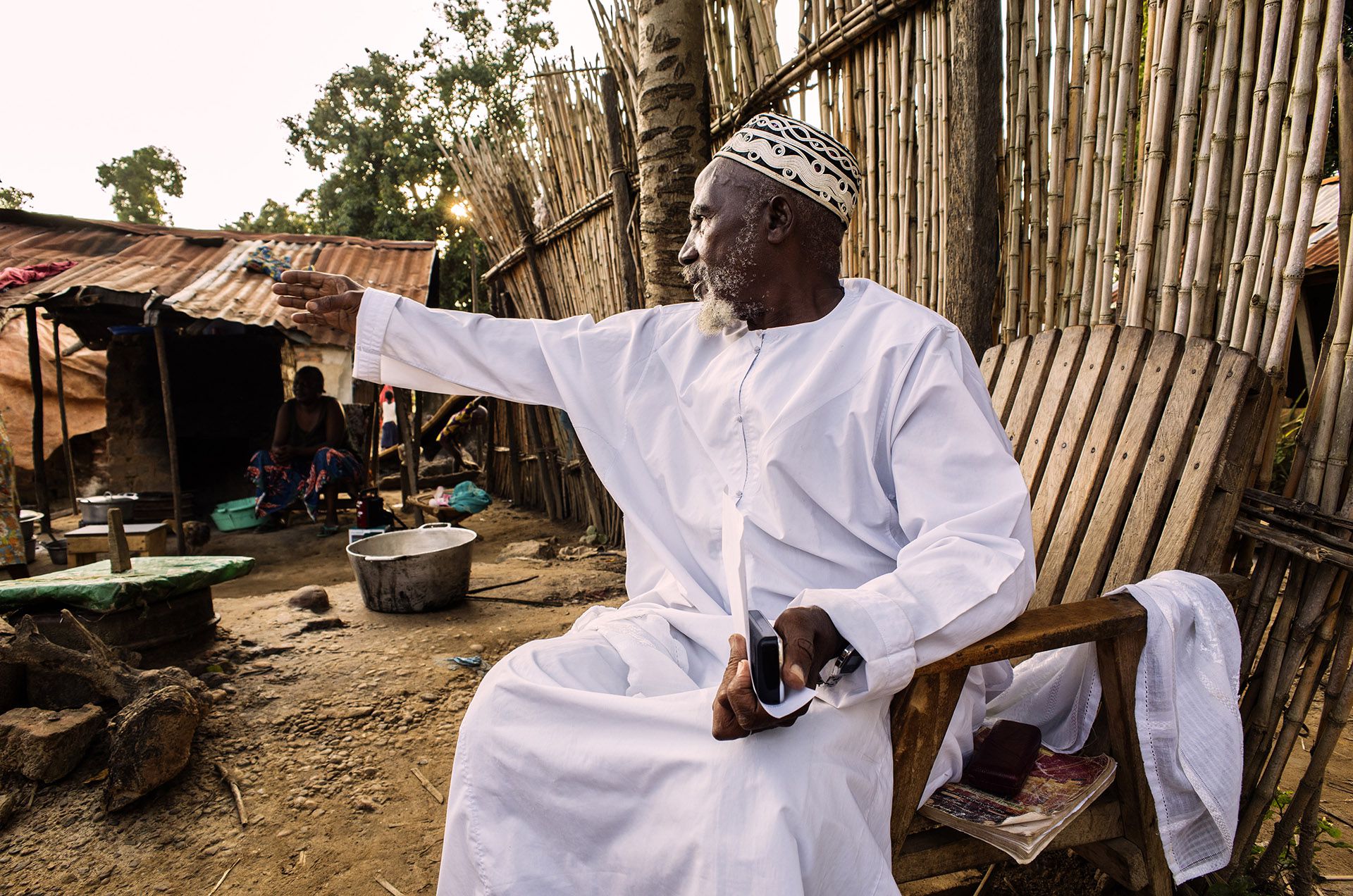 Central African Refugees / DRC As the sun sets, Imam Moussa Bawa, 72, gestures toward his home in Zongo, Equateur Province, DRC on 29 August, 2014. The Imam was born in nearby Libenge, DRC and has lived in Zongo for 34 years. “During the 34 years that I’ve been here, there have never been problems between Christians and Muslims," he says. "In Bangui [capital of neighboring Central African Republic] mosques have been destroyed. I’ve heard that more than 200 mosques have been destroyed in CAR. It’s a political problem. There is a need for reconciliation, and I’m ready to help." Conflict in CAR has caused more than a million people to flee their homes, one-quarter of them crossing an international border in their search for safety. Inter-communal violence between Christians and Muslims in CAR has further complicated the situation, for both those still inside the country, and for refugees abroad. UNHCR / B. Sokol / August 2014