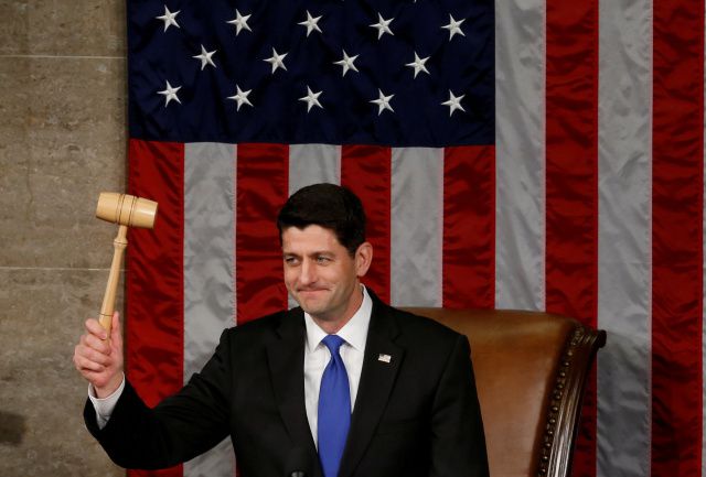 U.S. House Speaker Paul Ryan, R-Wis., raises the gavel during the opening session of the new Congress on Capitol Hill in Washington Jan. 3. Ryan, who is Catholic, was re-elected speaker of the House of Representatives earlier in the day. (CNS photo/Jonathan Ernst, Reuters) See CONGRESS-RELIGIONS-PEW Jan. 3, 2016.
